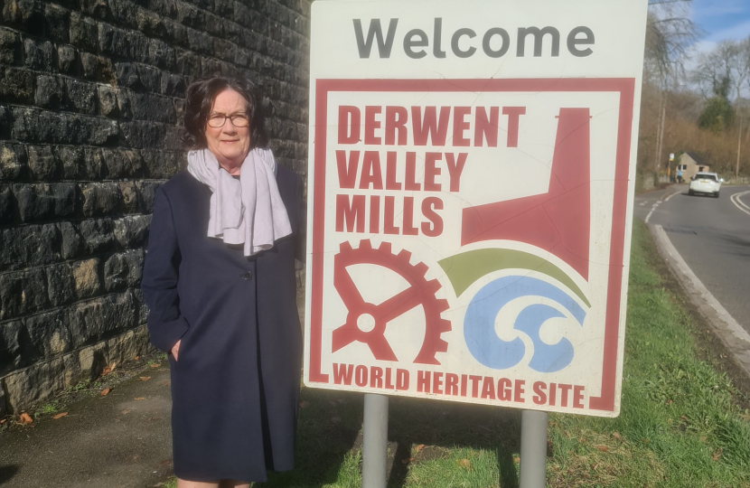 Pauline Latham OBE MP at Derwent Valley Mills sign