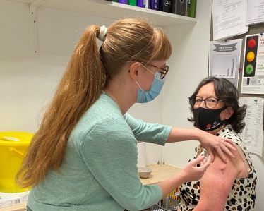 Pauline Latham OBE MP receives her annual flu jab at local pharmacy