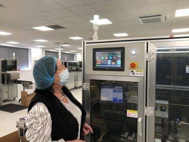 Pauline Latham MP with Lateral Flow Test machine