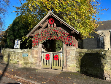 Little Eaton church decorated with poppies